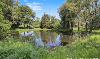 665 Honey Creek Ave NE, Ada, MI 49301