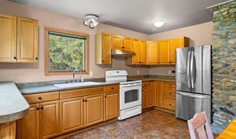 10150 SE East Torch Lake Dr, Alden, MI 49612