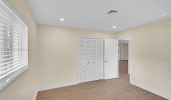 524 Muirfield Dr, Atlantis, FL 33462