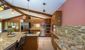 550 Greentree Ln NE, Ada, MI 49301