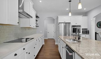 5220 Canyon River Dr NE, Ada, MI 49301