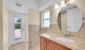 524 Muirfield Dr, Atlantis, FL 33462