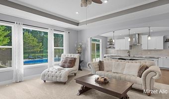 5220 Canyon River Dr NE, Ada, MI 49301