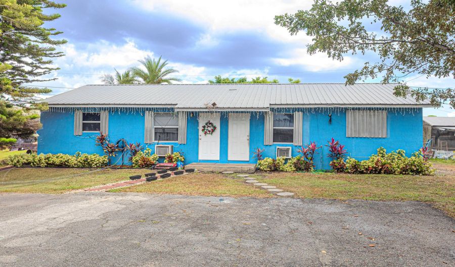 1043 NE 20th St, Belle Glade, FL 33430 - 4 Beds, 2 Bath