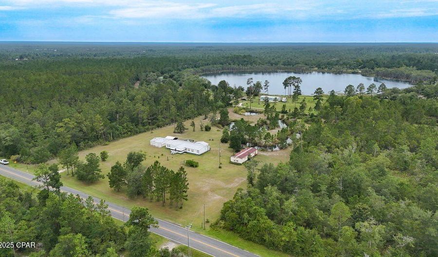 22390 NW Valencia Dr, Altha, FL 32421 - 4 Beds, 3 Bath