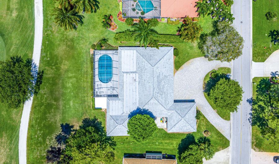 489 S Country Club Dr, Atlantis, FL 33462 - 4 Beds, 3 Bath