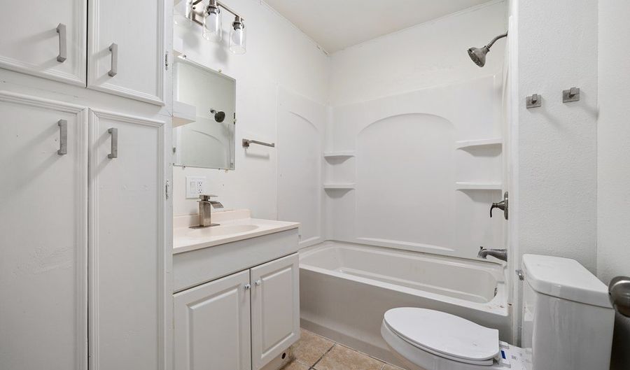215 S 11TH St, Aransas Pass, TX 78336 - 4 Beds, 2 Bath