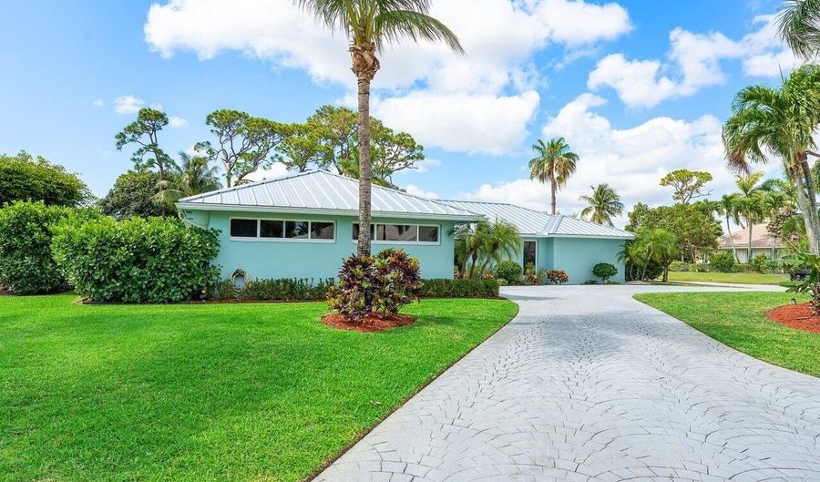 474 S Country Club Dr, Atlantis, FL 33462 - 4 Beds, 3 Bath