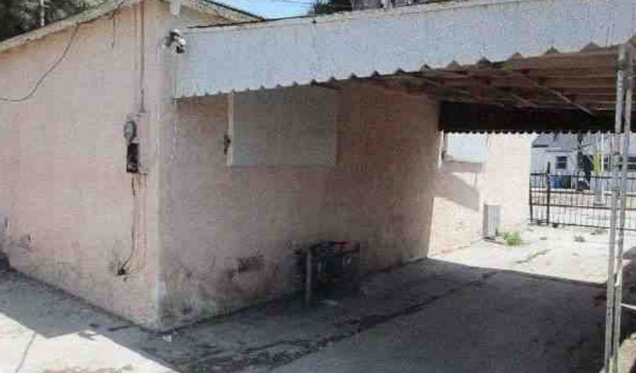 9715 S Hoover St, Los Angeles, CA 90044 - 4 Beds, 3 Bath