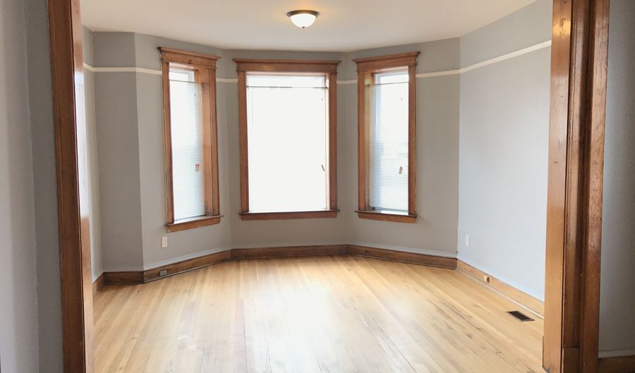 2215 S Albany Ave 1F, Chicago, IL 60623 - 4 Beds, 2 Bath