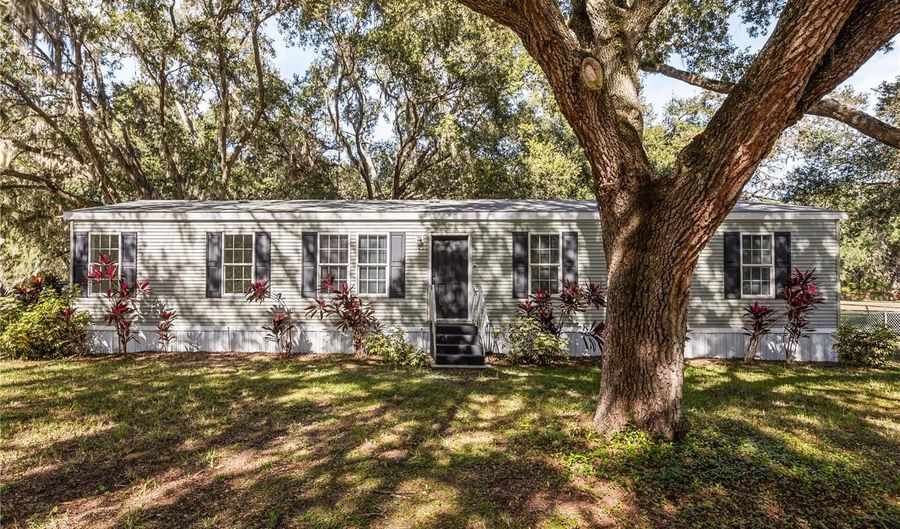 14233 TASSLEFLOWER Ct, Astatula, FL 34705 - 4 Beds, 2 Bath