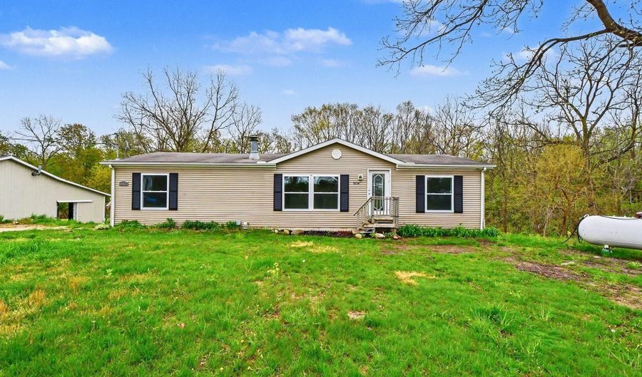 9214 S Cedar Dr, Allendale, MI 49401 - 5 Beds, 3 Bath