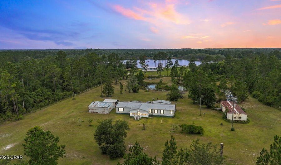 22390 NW Valencia Dr, Altha, FL 32421 - 4 Beds, 3 Bath