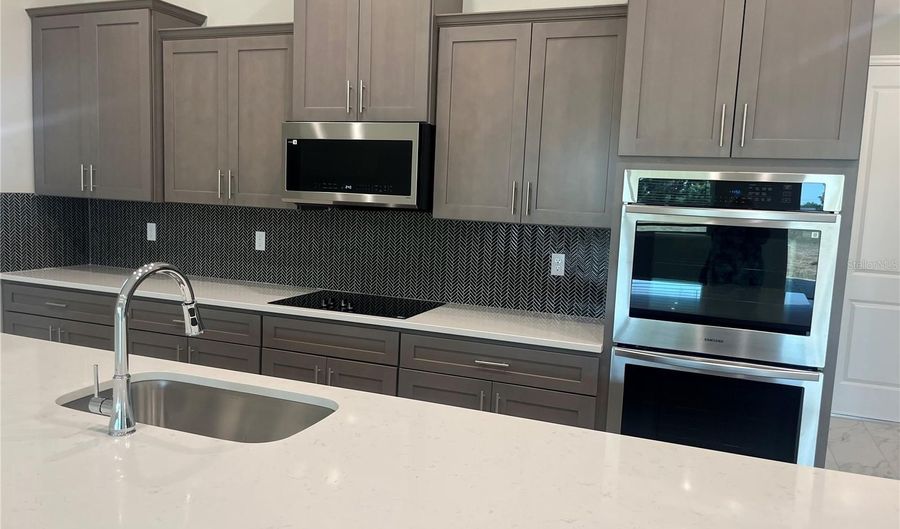 12975 STILLWATER COVE Dr, Astatula, FL 34705 - 4 Beds, 3 Bath