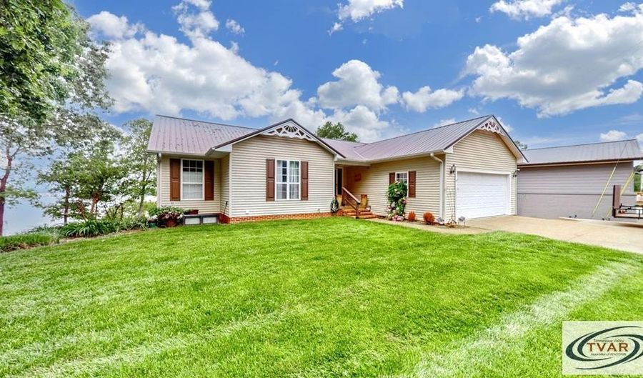 495 Shore Dr, Big Sandy, TN 38221 - 4 Beds, 3 Bath