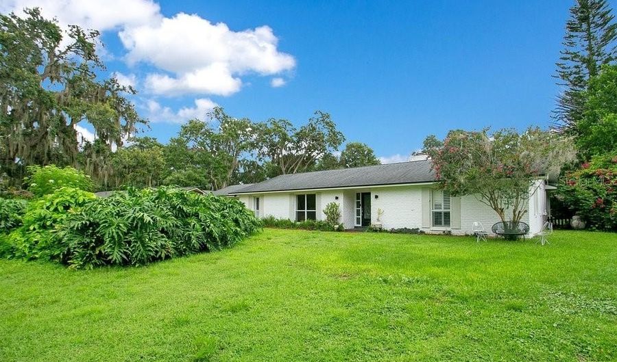 5867 COVE Dr, Belle Isle, FL 32812 - 4 Beds, 2 Bath