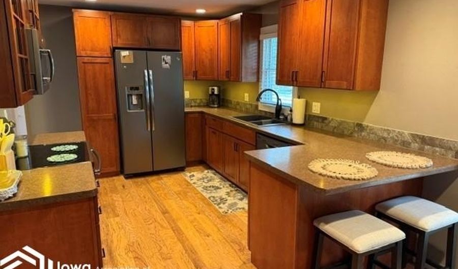 1215 N McCoy St, Algona, IA 50511 - 4 Beds, 3 Bath