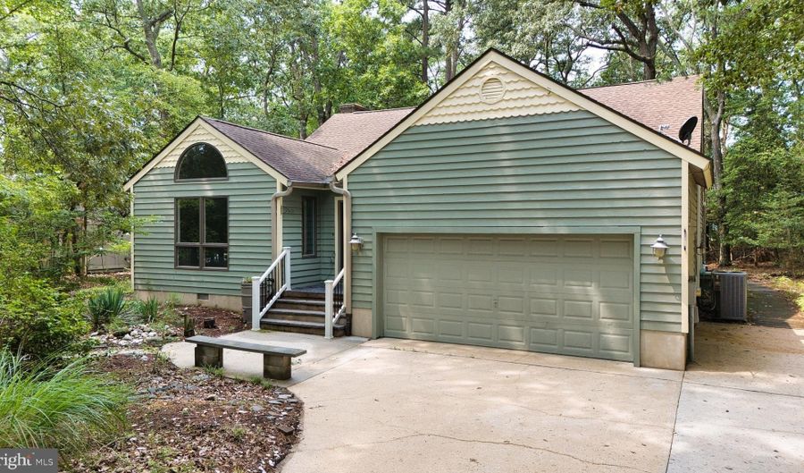 23735 WOODS Dr, Lewes, DE 19958 - 5 Beds, 3 Bath