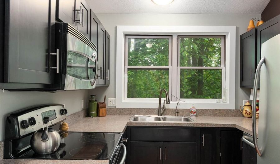 7105 SE Torch Lk, Alden, MI 49612 - 4 Beds, 3 Bath