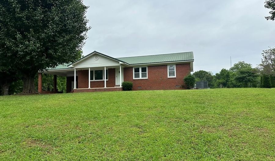 13890 Church St, Atwood, TN 38220 - 3 Beds, 2 Bath