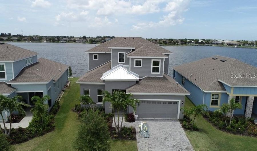 5327 WISHING ARCH Dr, Apollo Beach, FL 33572 - 4 Beds, 4 Bath