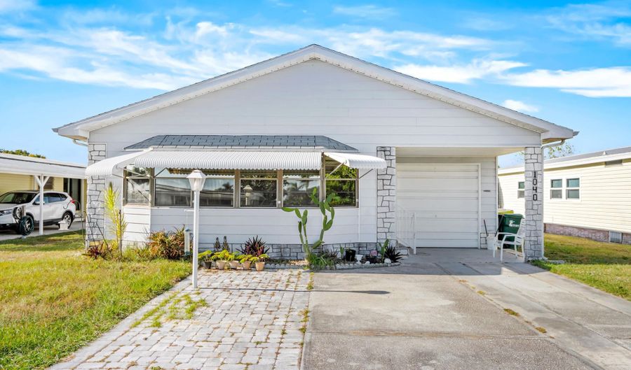 1040 Waterway Dr, Barefoot Bay, FL 32976 - 3 Beds, 3 Bath