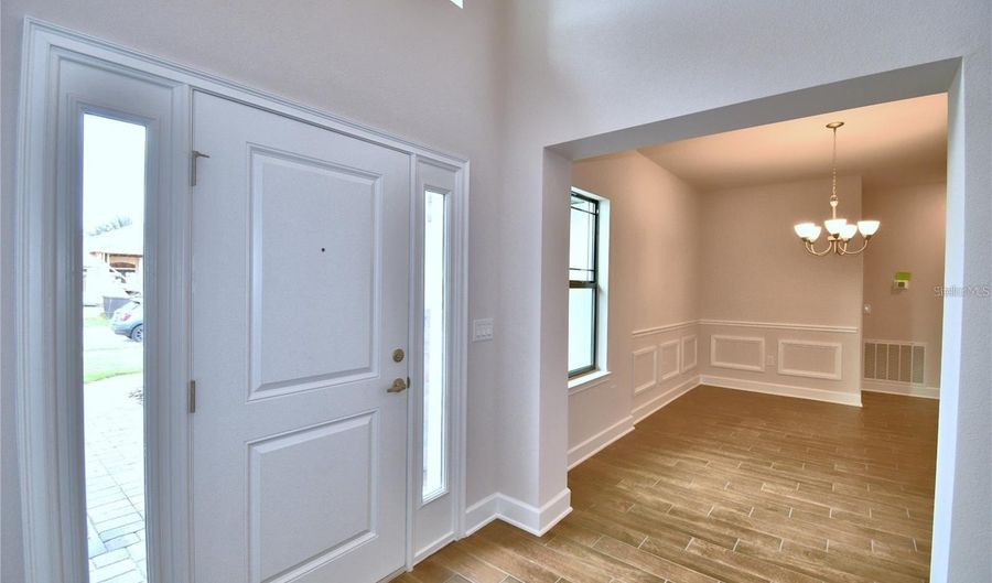 4312 JULIANA LAKE Dr, Auburndale, FL 33823 - 5 Beds, 3 Bath