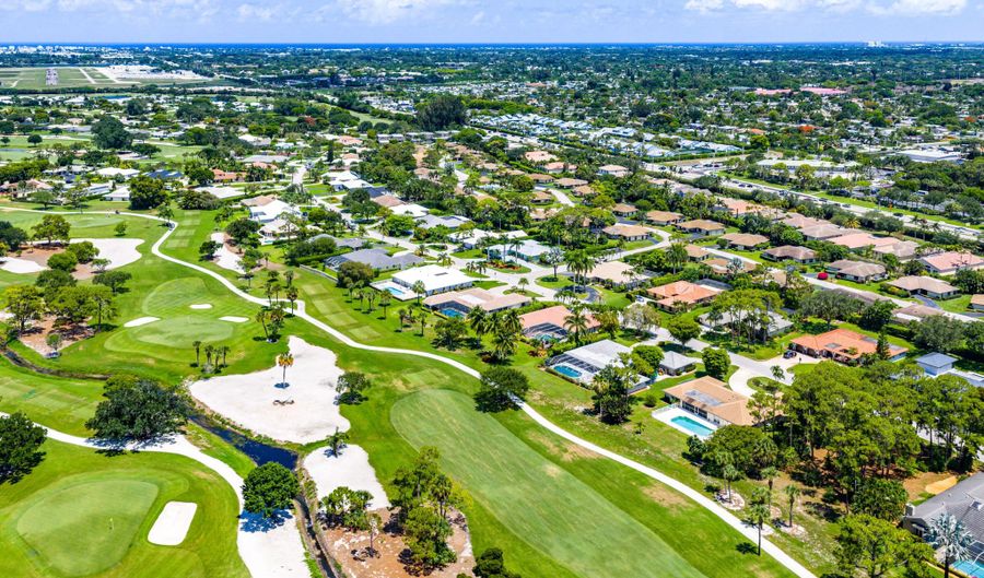 489 S Country Club Dr, Atlantis, FL 33462 - 4 Beds, 3 Bath