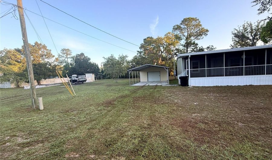 21809 SUNSET Dr, Astor, FL 32102 - 3 Beds, 2 Bath