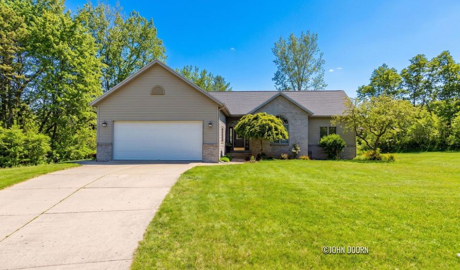 57 Rollingbrook Dr NE, Ada, MI 49301 - 5 Beds, 3 Bath