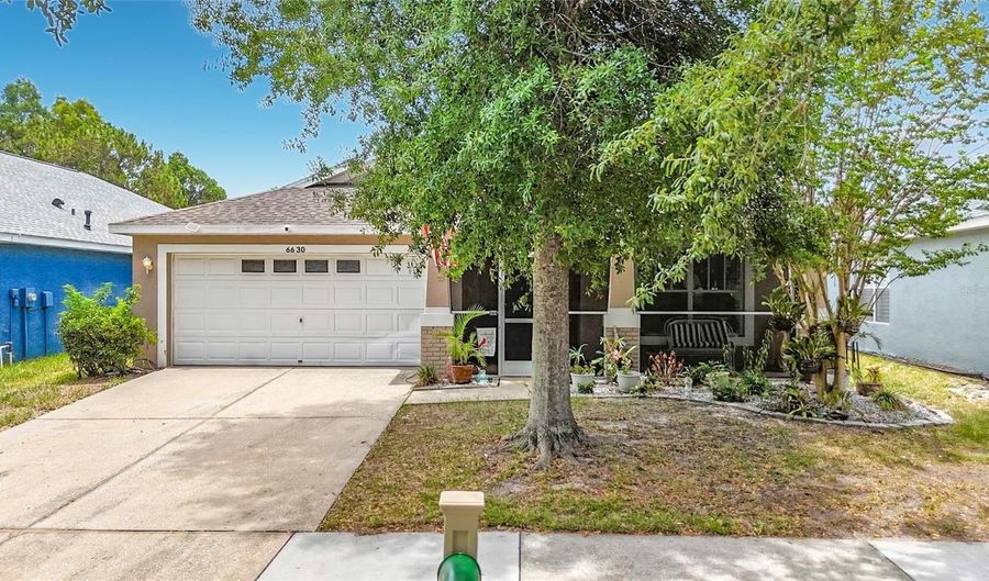 6630 CAMBRIDGE PARK Dr, Apollo Beach, FL 33572 - 4 Beds, 2 Bath