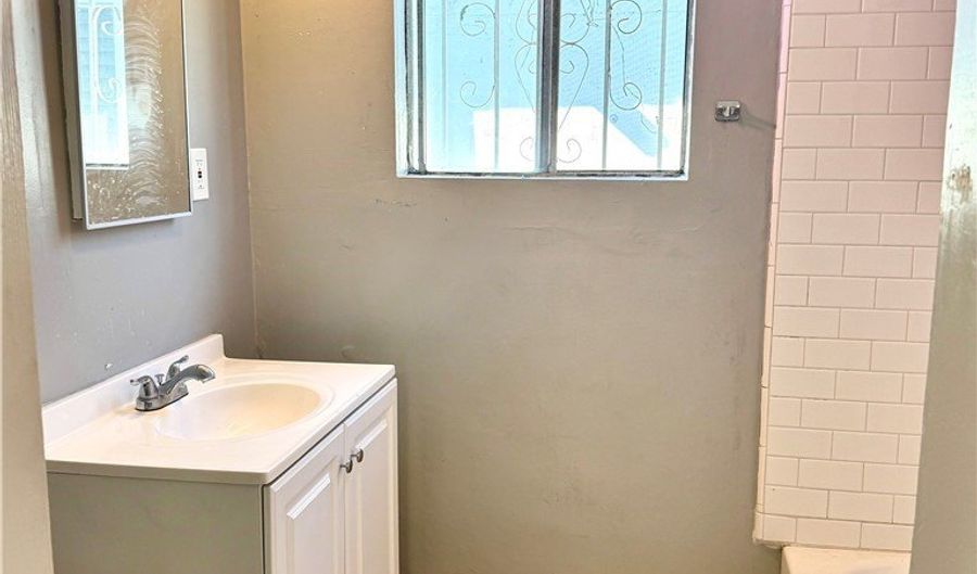 227 E 111th St, Los Angeles, CA 90061 - 5 Beds, 3 Bath