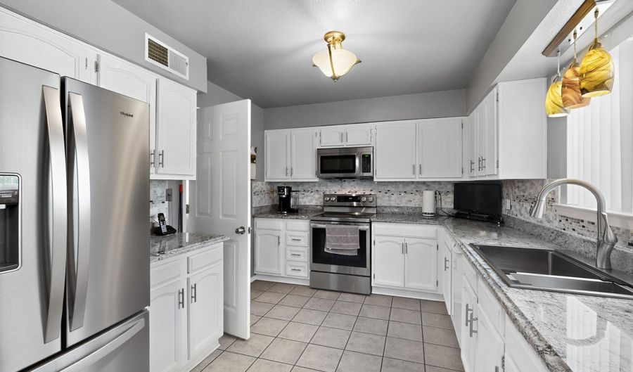 1212 MICHAEL HUGHES Dr NE, Albuquerque, NM 87112 - 4 Beds, 3 Bath