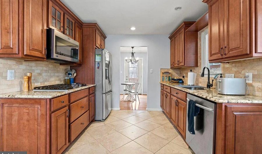 7005 STONE MILL Pl, Alexandria, VA 22306 - 4 Beds, 3 Bath
