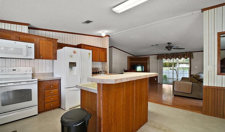 13137 KANSAS Ave, Astatula, FL 34705 - 4 Beds, 2 Bath