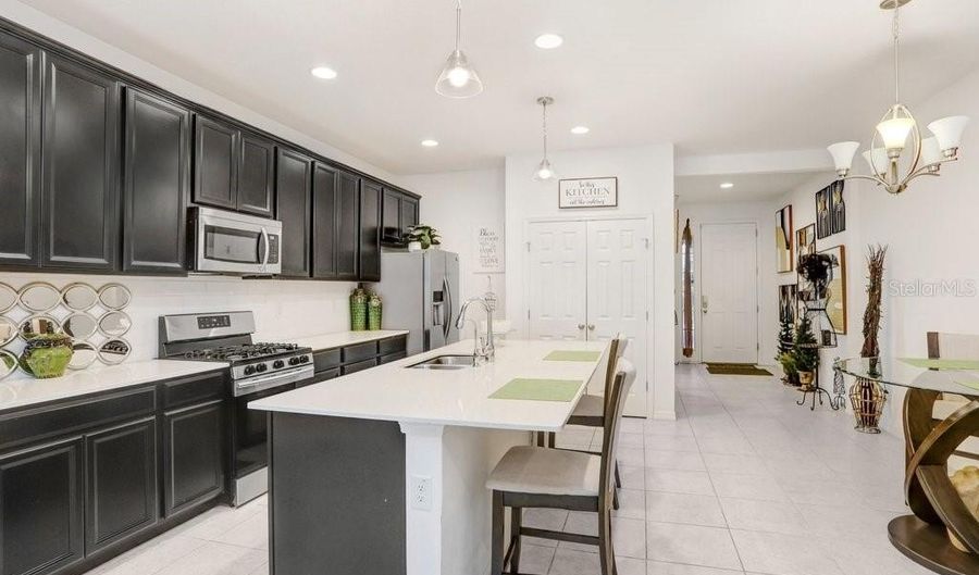 6321 CAMINO Dr, Apollo Beach, FL 33572 - 4 Beds, 3 Bath
