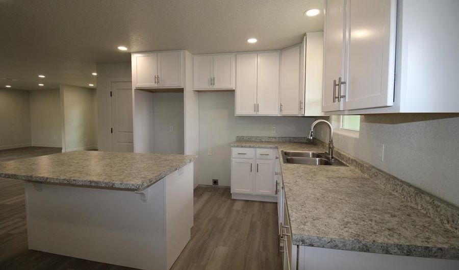 607 NW 11th St, Andrews, TX 79714 - 3 Beds, 2 Bath