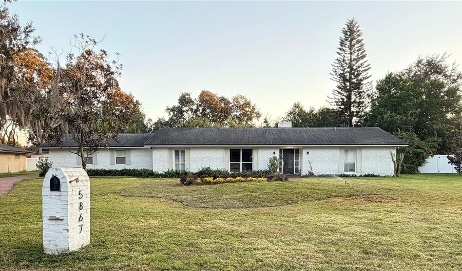 5867 COVE Dr, Belle Isle, FL 32812 - 4 Beds, 2 Bath