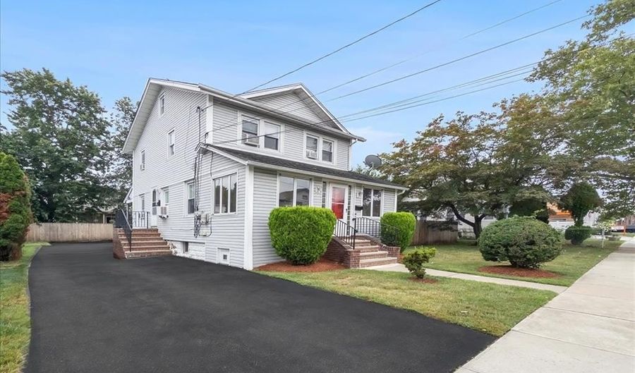 14 Magnolia St, Bergenfield, NJ 07621 - 4 Beds, 2 Bath