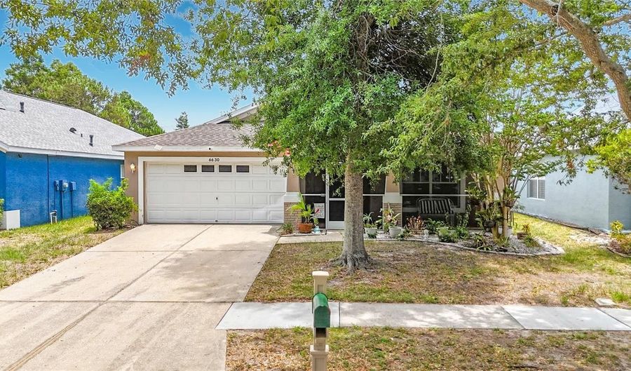 6630 CAMBRIDGE PARK Dr, Apollo Beach, FL 33572 - 4 Beds, 2 Bath