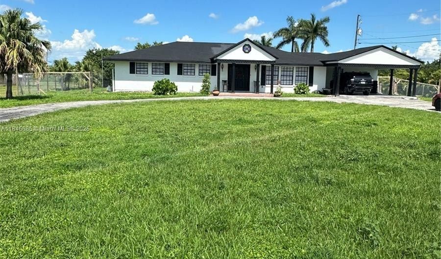 925 NE 18th, Belle Glade, FL 33430 - 5 Beds, 4 Bath
