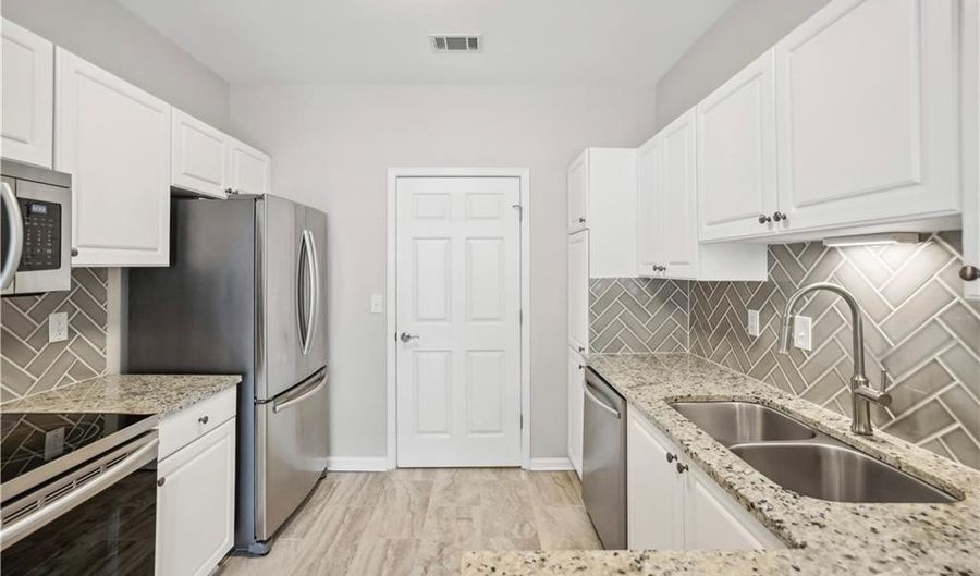 7110 Woodland Ln, Alpharetta, GA 30009 - 2 Beds, 3 Bath