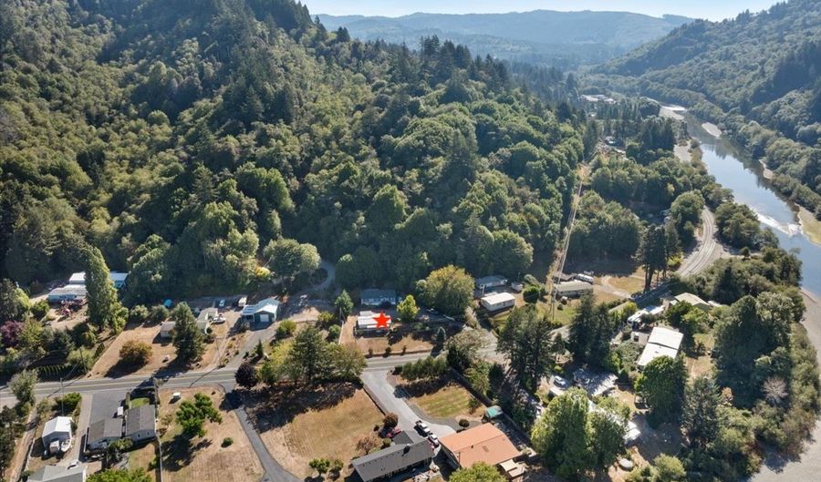 98465 N BANK CHETCO RIVER Rd, Brookings, OR 97415 - 3 Beds, 2 Bath