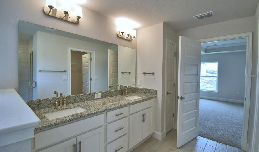 4422 JUNEBERRY Dr, Auburndale, FL 33823 - 4 Beds, 3 Bath