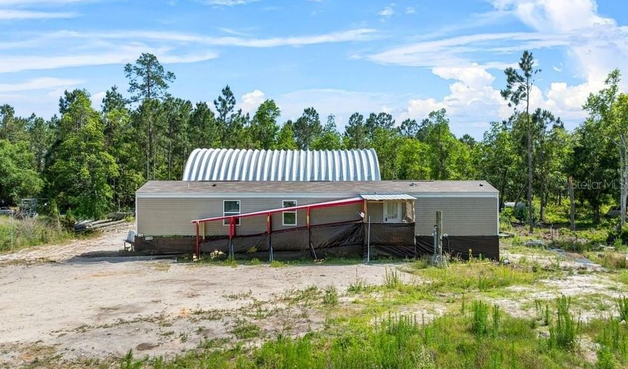 14300 BEVERLY Dr, Astatula, FL 34705 - 5 Beds, 4 Bath