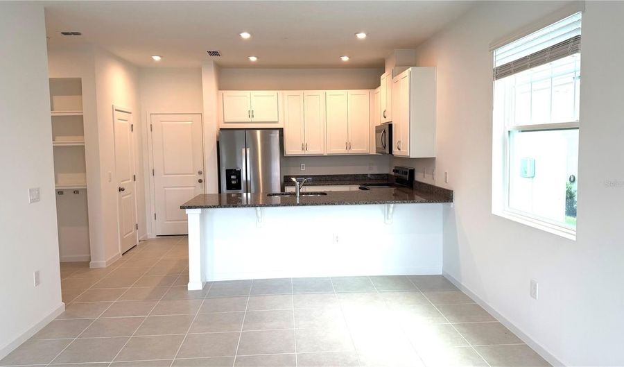 2947 CAMELLIA FLOWER St, Apopka, FL 32703 - 4 Beds, 3 Bath