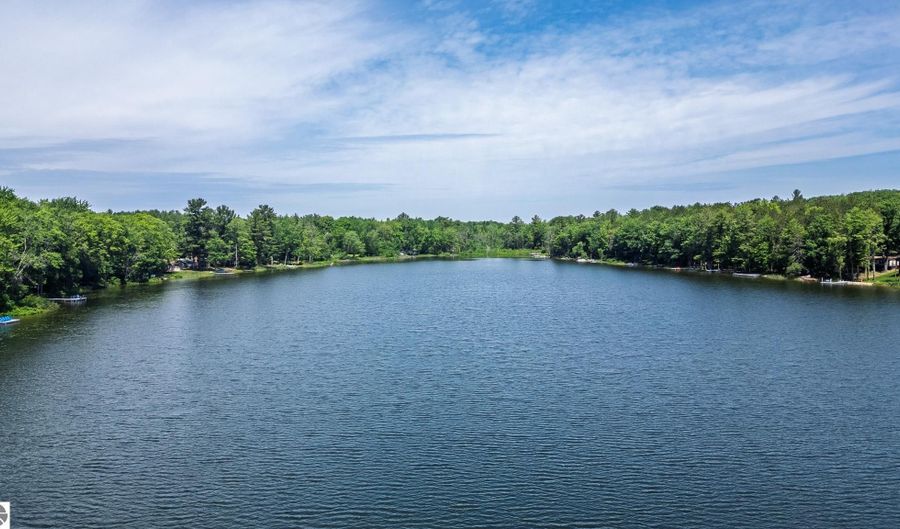 7105 SE Torch Lake Dr, Alden, MI 49612 - 4 Beds, 3 Bath