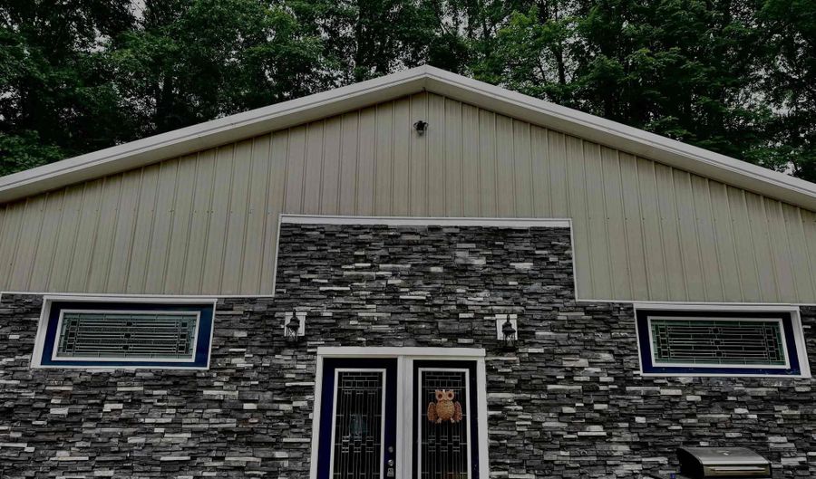 8923 SE Torch Lake Dr, Alden, MI 49612 - 4 Beds, 4 Bath